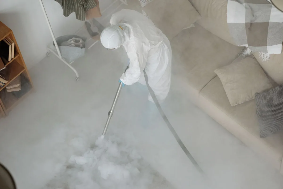 Biohazard cleanup technician in protective equipment, Vero Beach, FL